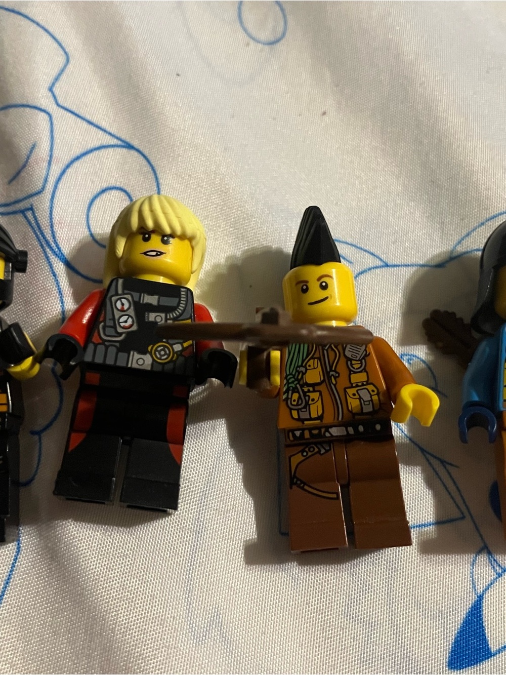 Lego Minifigure Duo in Yellow, Black, Red, Brown